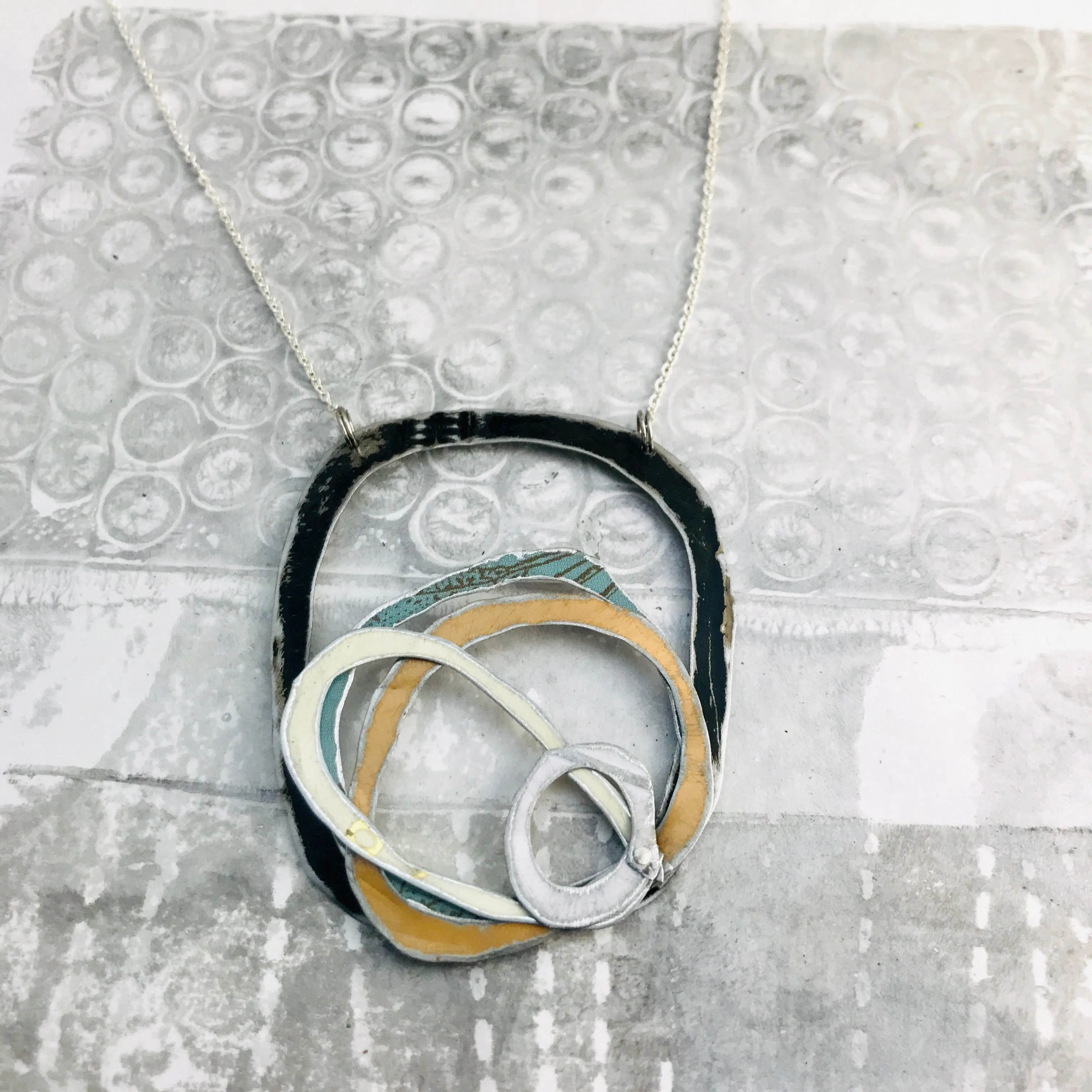 Black, Snows, Gold, & Dusty Blue Scribbles Upcycled Tin Necklace
