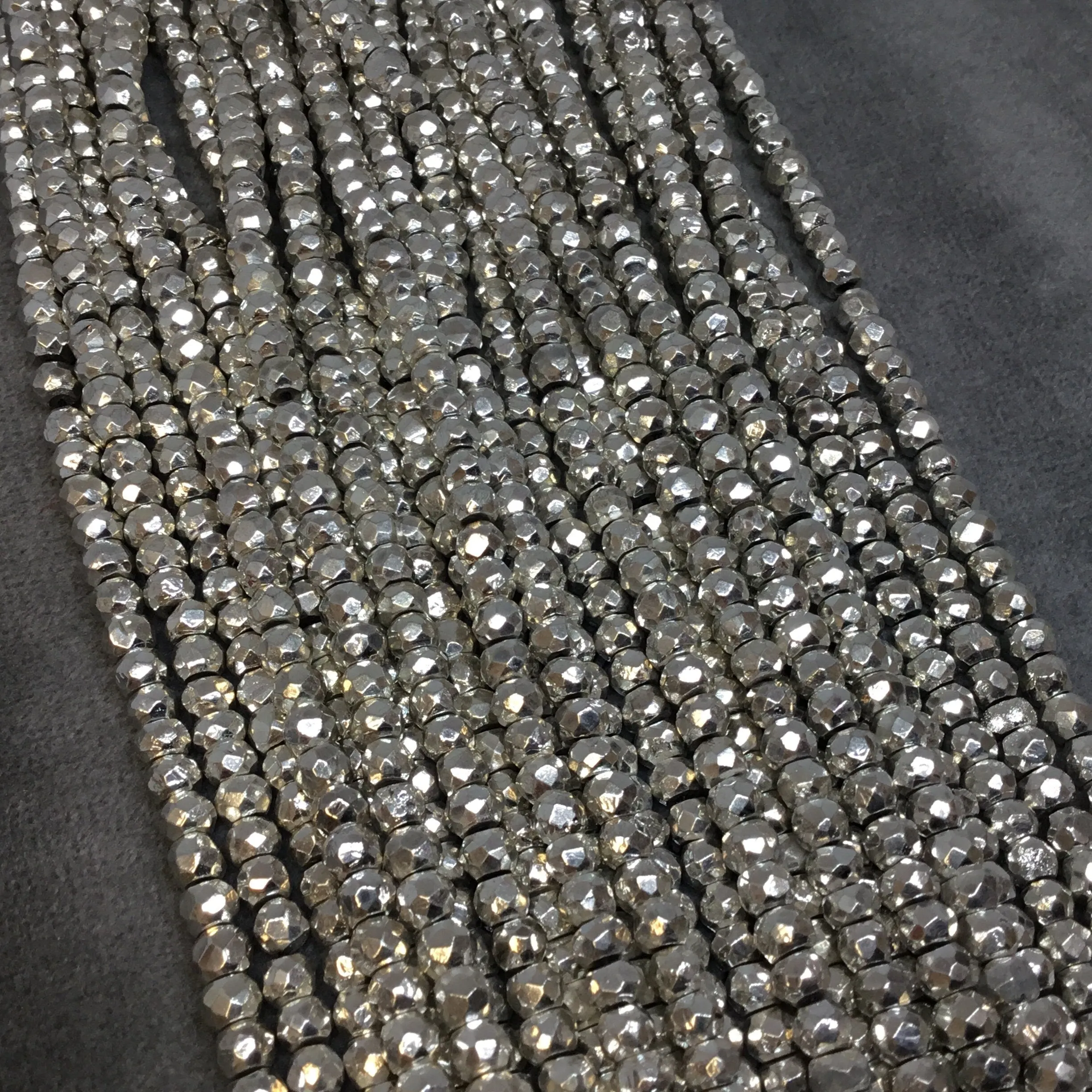 Silver Plated Natural Pyrite Faceted Rondelle Beads | 4mm | 14" Strand | Approx. 125 Beads Per Strand.