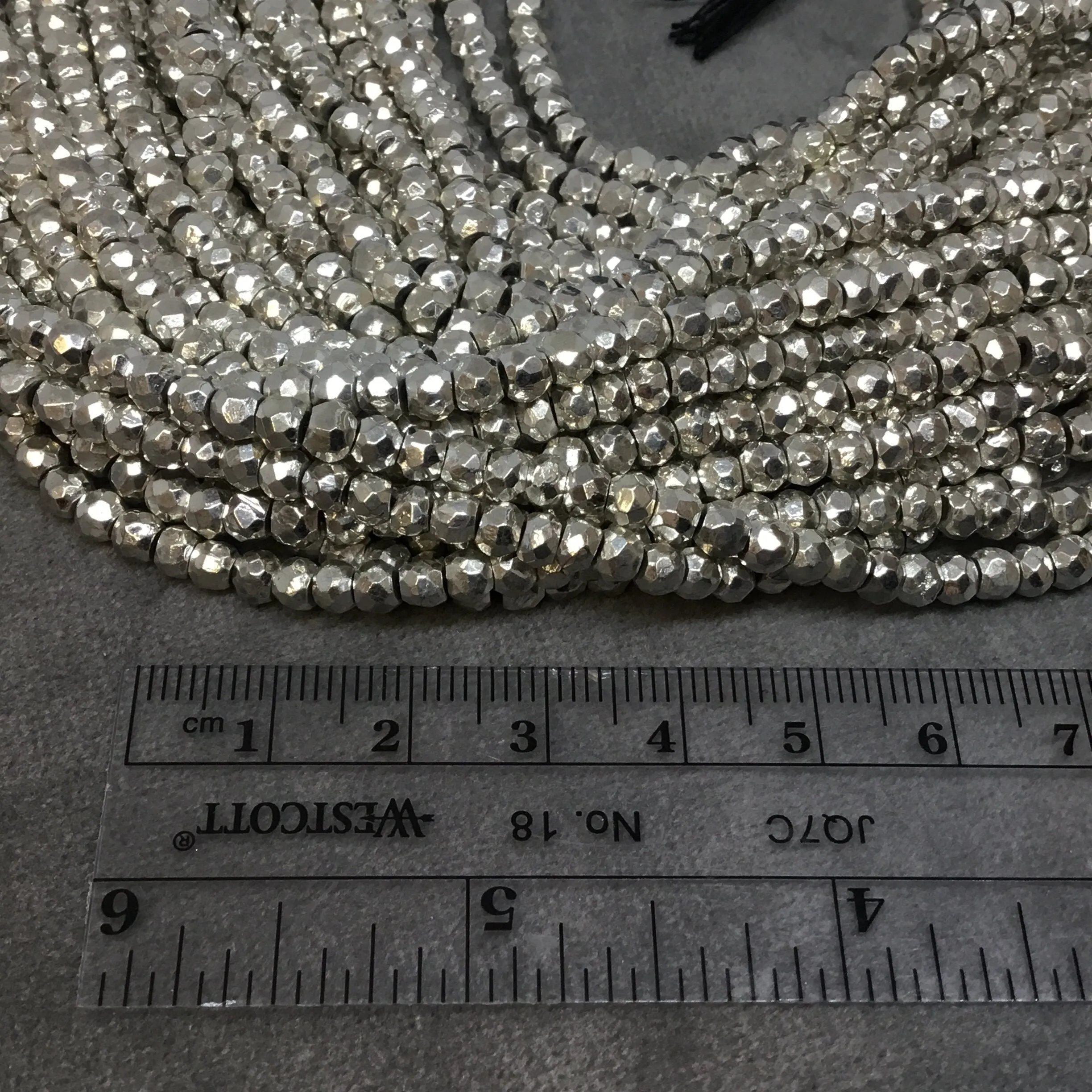 Silver Plated Natural Pyrite Faceted Rondelle Beads | 4mm | 14" Strand | Approx. 125 Beads Per Strand.